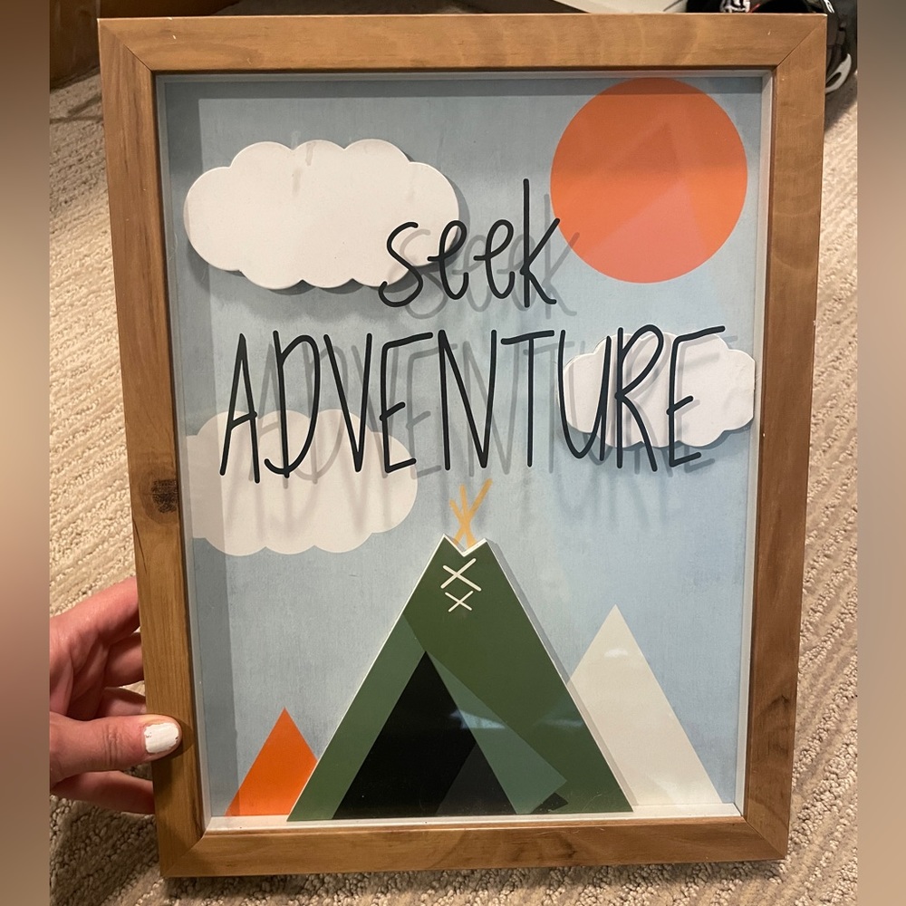 Seek adventure sign